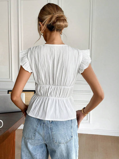 FRENCHY | BLOUSE AVEC NŒUD CAP MANCHES COURTES